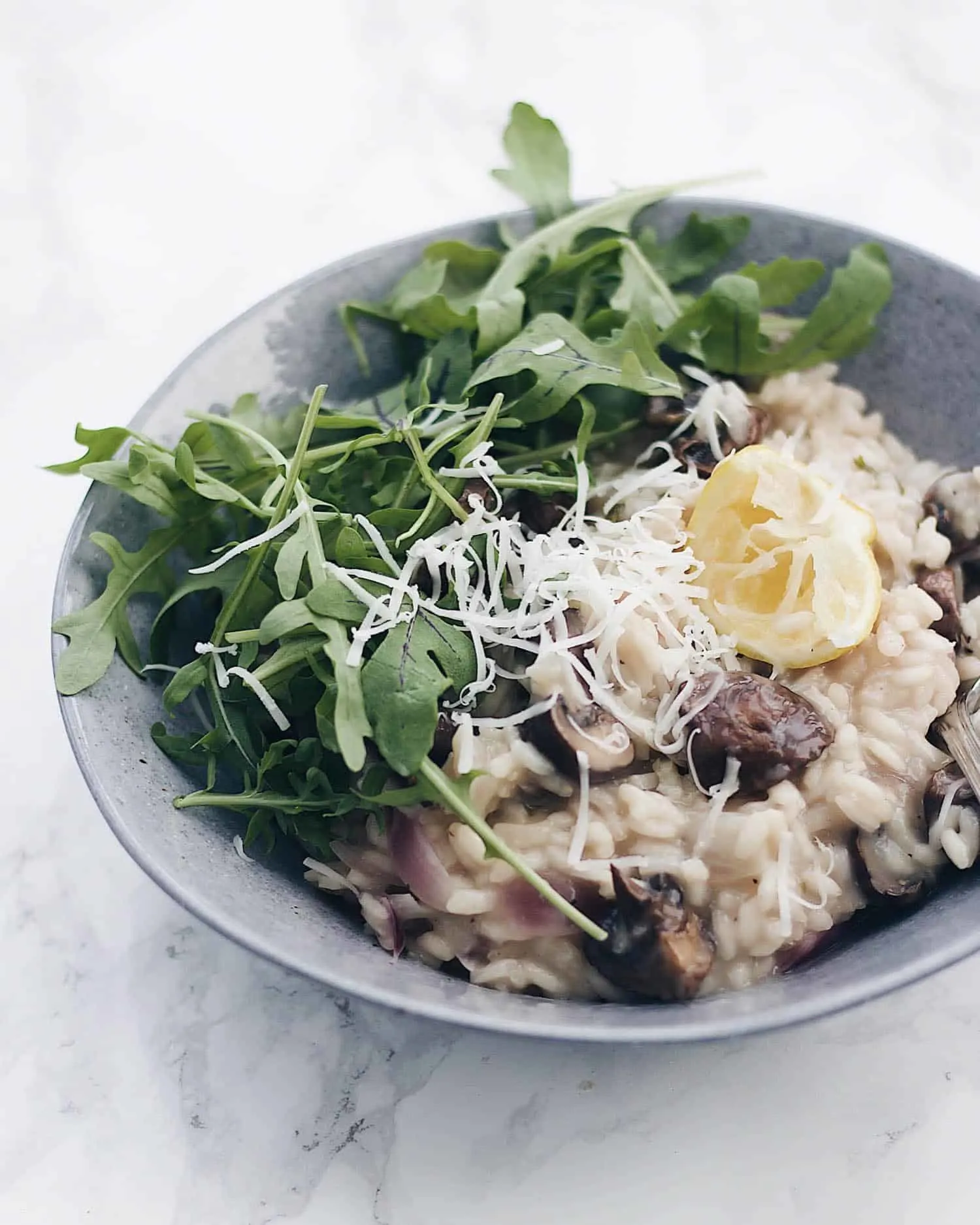 Vegan roasted mushroom risotto with lemon, garlic and parsley