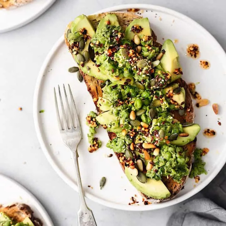 Smashed Peas and Avocado on Toast #vegan #recipe #breakfast #avocado