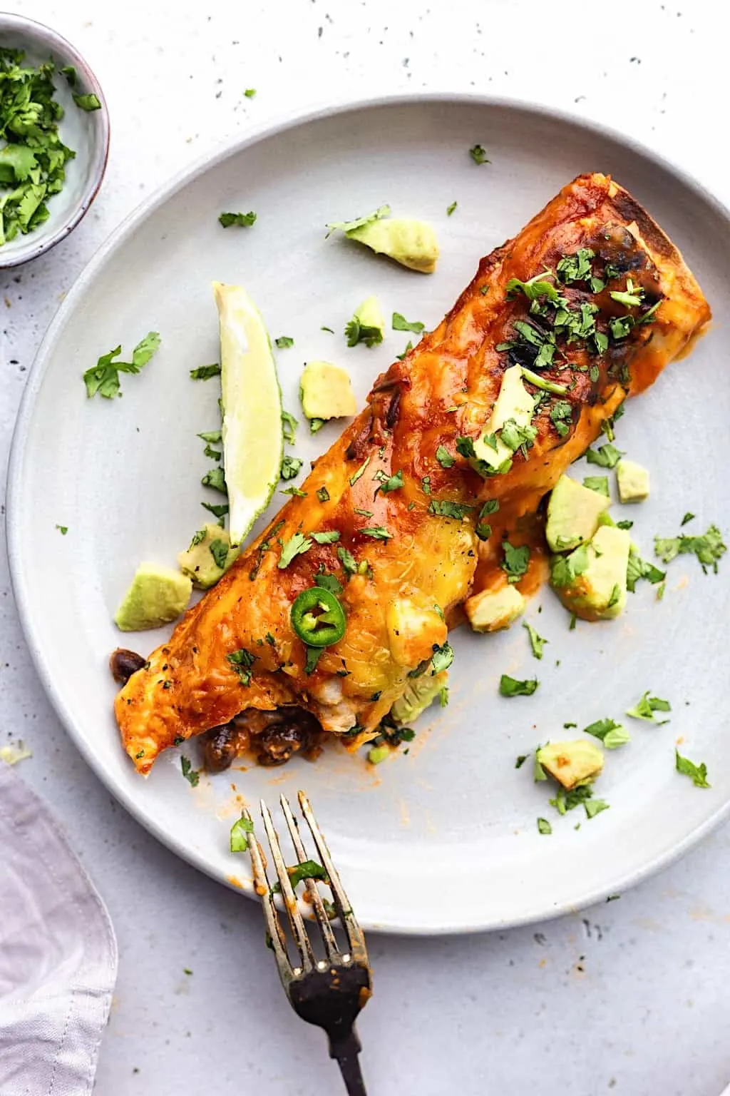 Vegan Black Bean and Sweet Potato Enchiladas #sweetpotato #blackbeans #mexican #vegan #recipe #enchiladas