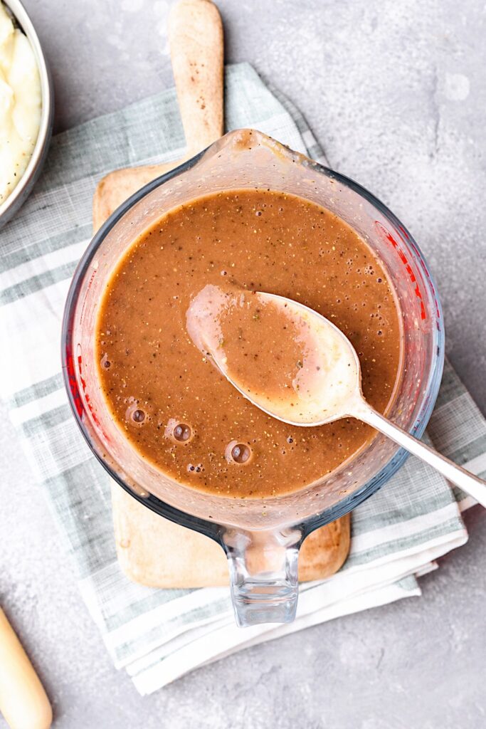 https://cupfulofkale.com/wp-content/uploads/2020/10/Vegan-Gravy-Spoon-683x1024.jpg